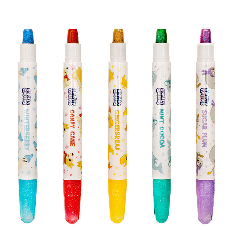 Candy Cane, Mint Cocoa, Winterberry, Sugar Plum, and Gingerbread scented Holiday Glitter Smelly Gellies Gel Crayons Fanned out without caps on